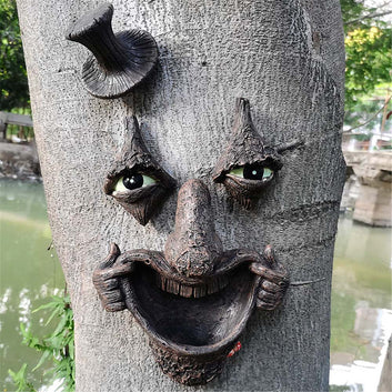 Smiling Joker Tree Face Bird Feeder