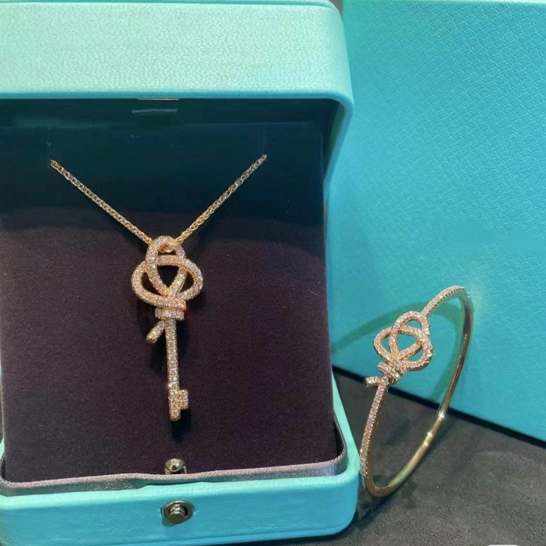 Crystal-Accent Woven Knot Key Pendant Necklace - view 2