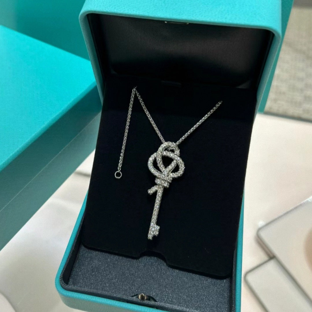 Crystal-Accent Woven Knot Key Pendant Necklace - view 3
