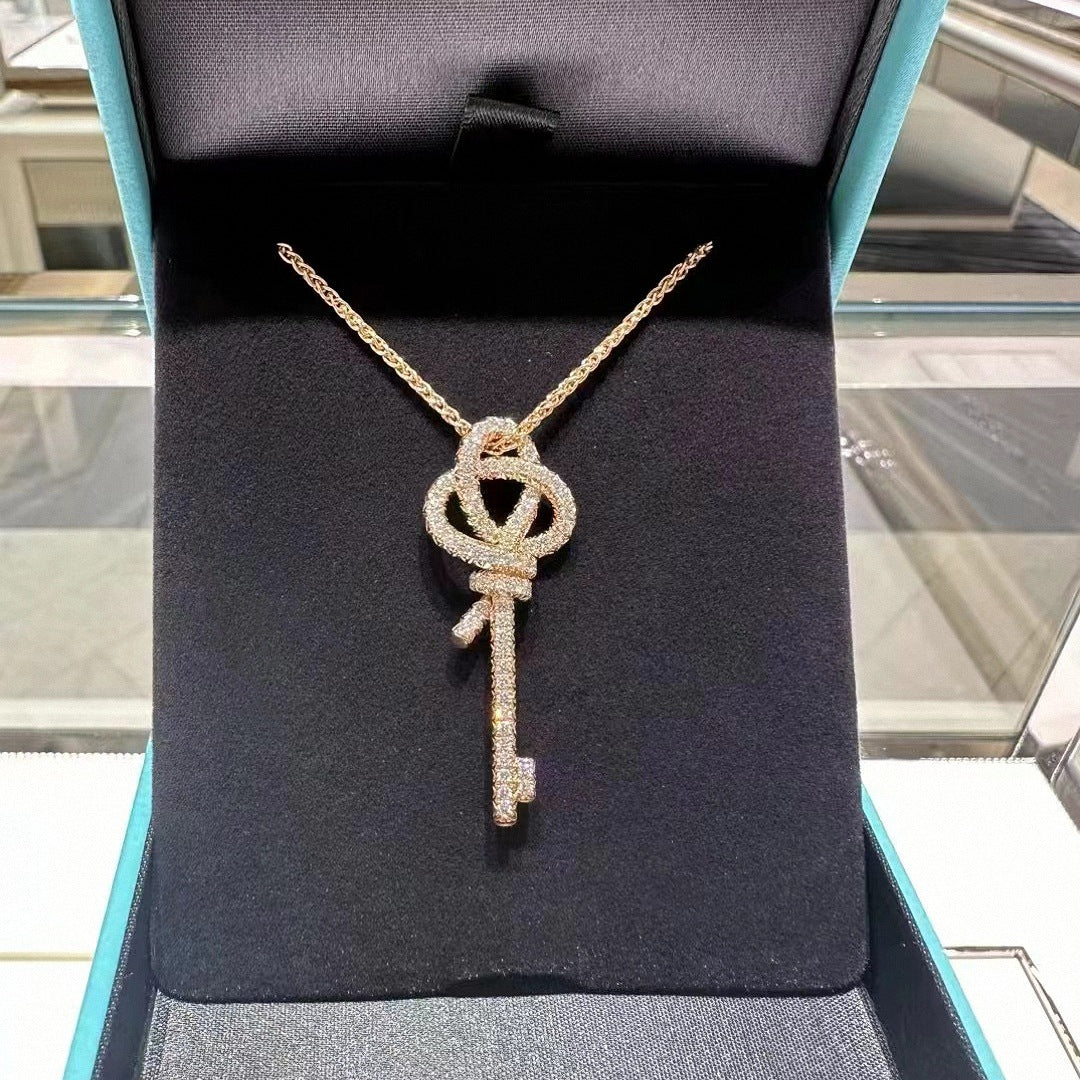 Crystal-Accent Woven Knot Key Pendant Necklace - view 6